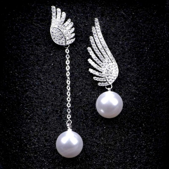 Jewelry - 🌟 Sterling Silver Asymmetrical Wings Earrings